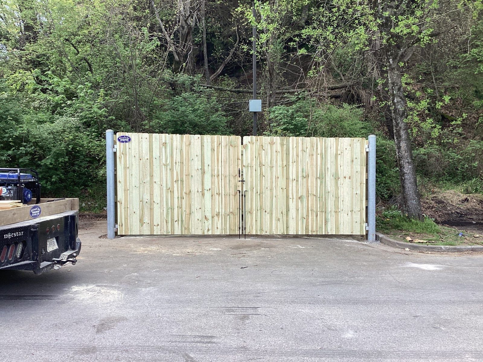Wood dumpster enclosure gates