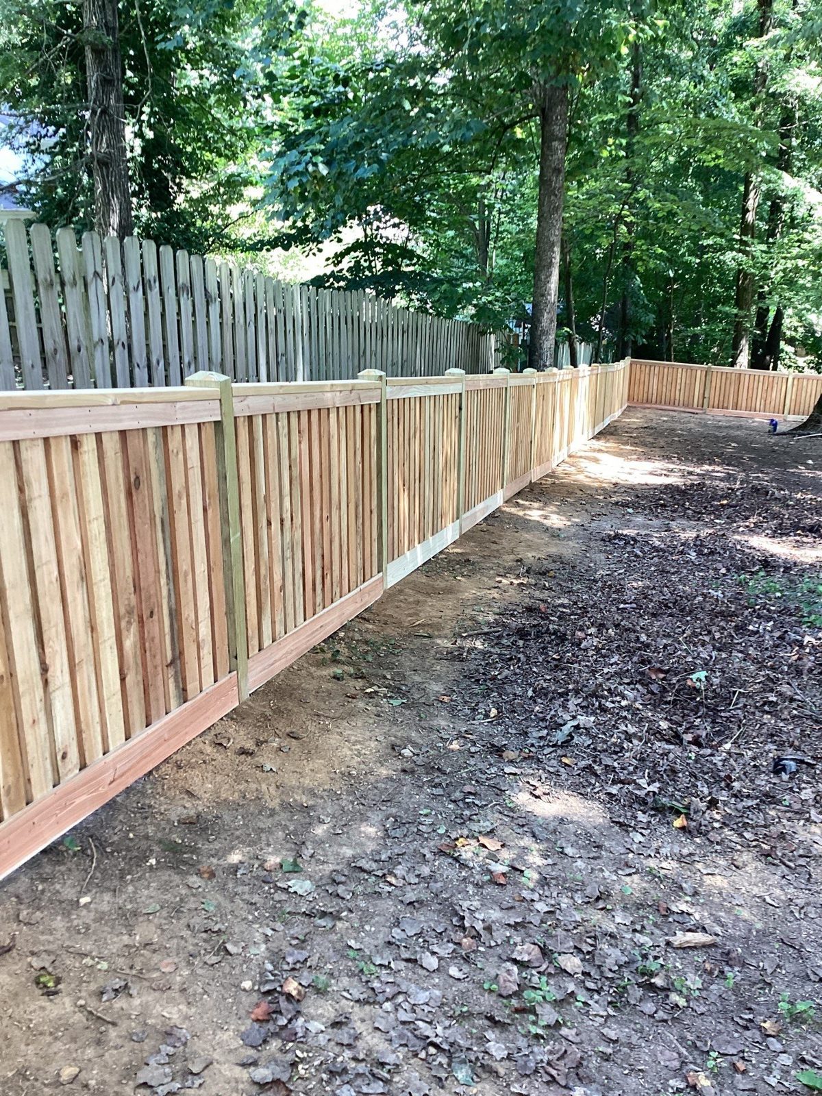 Wood privacy fence line